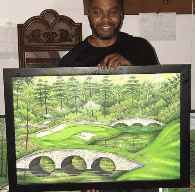 Valentino with his painting.